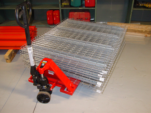 Wire Decking Waiting to beInstalled on Pallet RackShelves